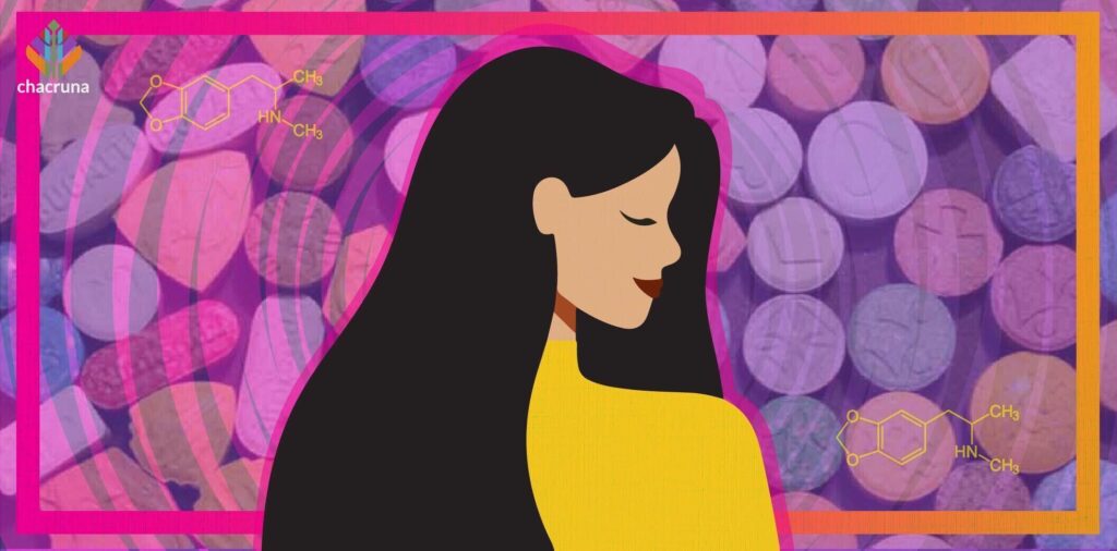 A woman with long dark hair and yellow shirt, background is an image of ecstasy pills