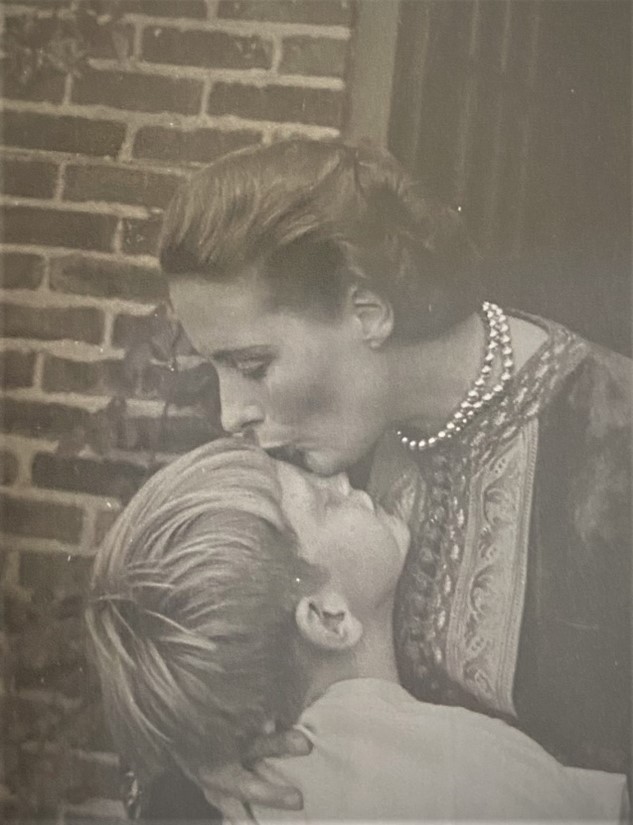 Jane Osmond kisses her son, Julian, on the forehead.