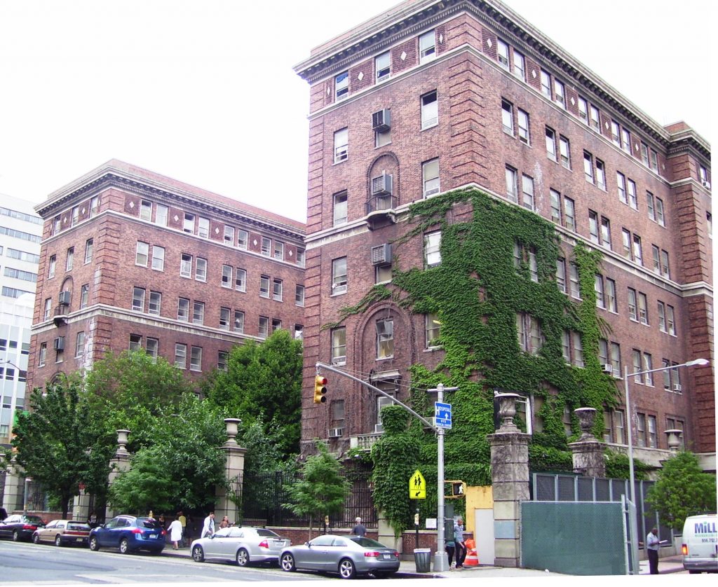 Original Bellevue Psychiatric Hospital exterior, a brick building with two wings.