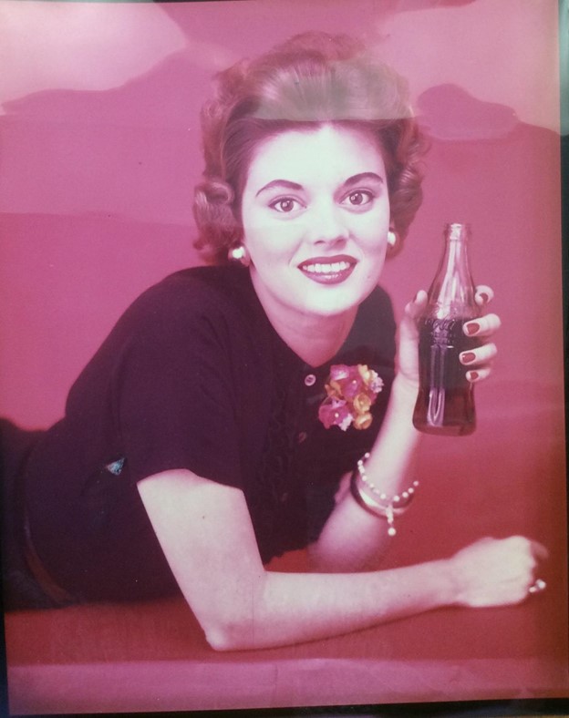 Rosemary Woodruff-Leary posing in a coke commercial.