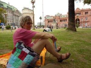 Esther Jean Langdon in Brazil in 2010, sitting on a lawn