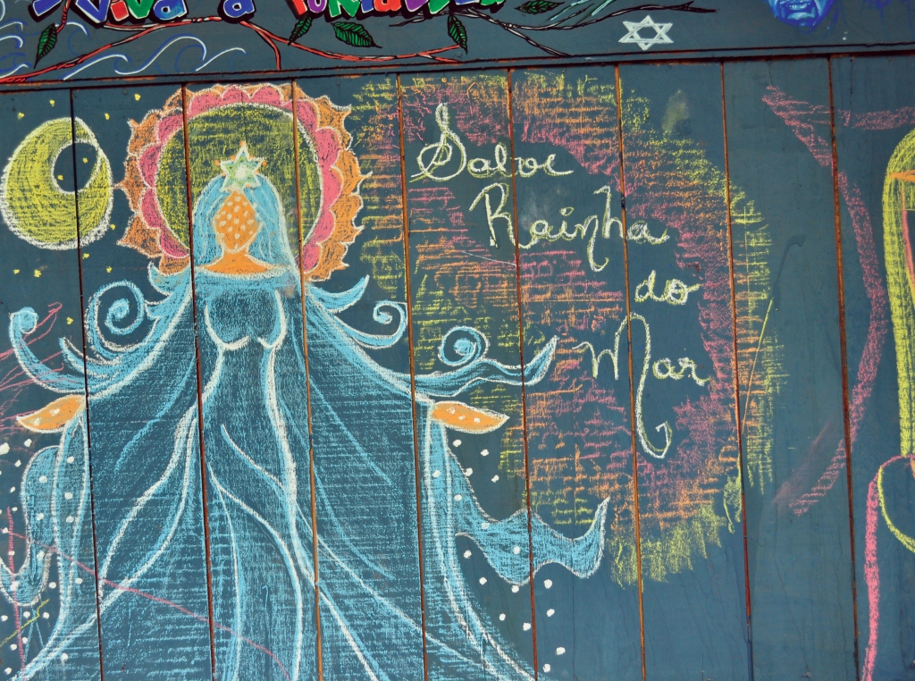 Street art image of Virgin Mary drawn with chalk.