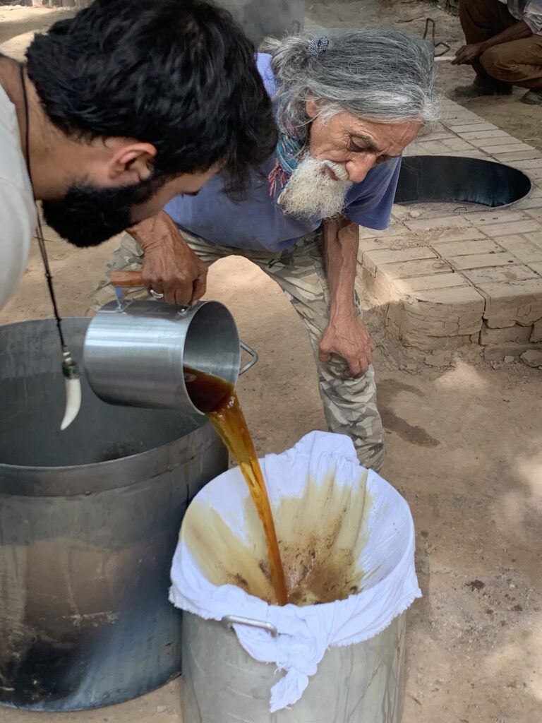 Glauber and Elias filtering ayahuasca.
